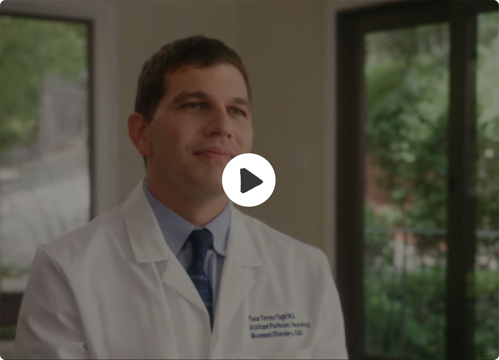 Video play button featuring an image of Dr.Yasar Torres-Yaghi